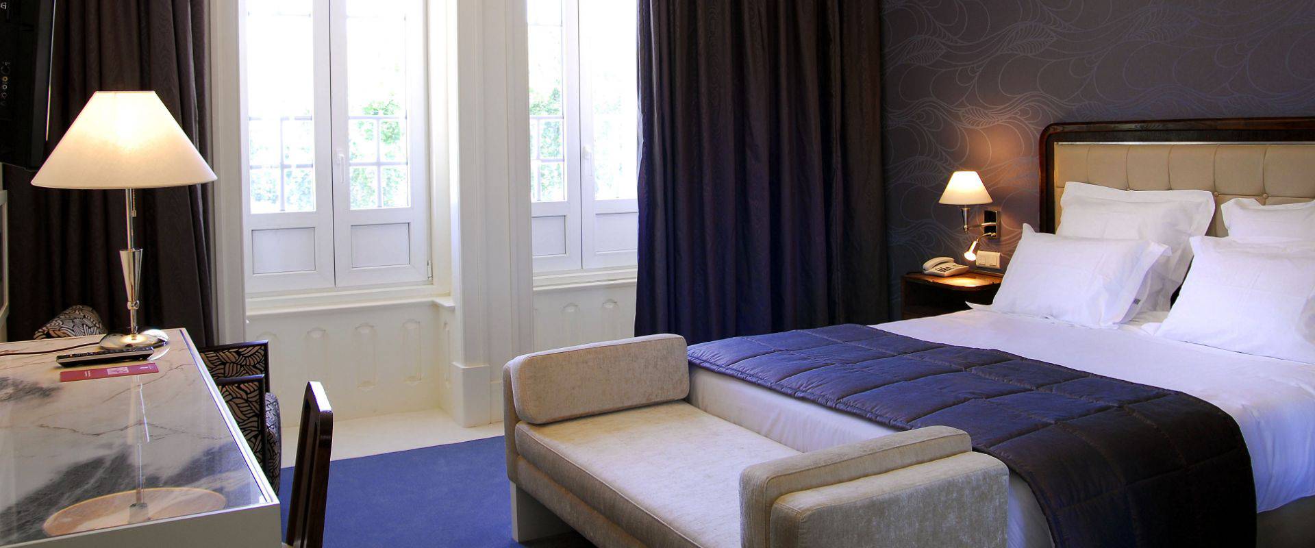 Classic room with an individual bed and exterior view  Curia Palace Hotel Coimbra